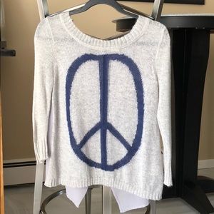 Gray sweater with Navy blue Peace sign.